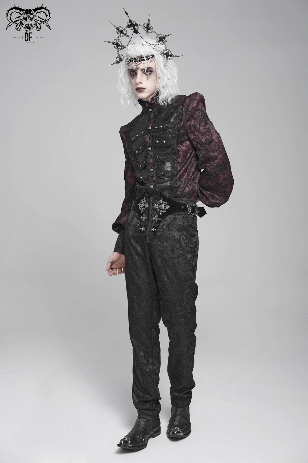Close-up view of black gothic cargo pants embroidery pattern and jacquard brocade weave texture