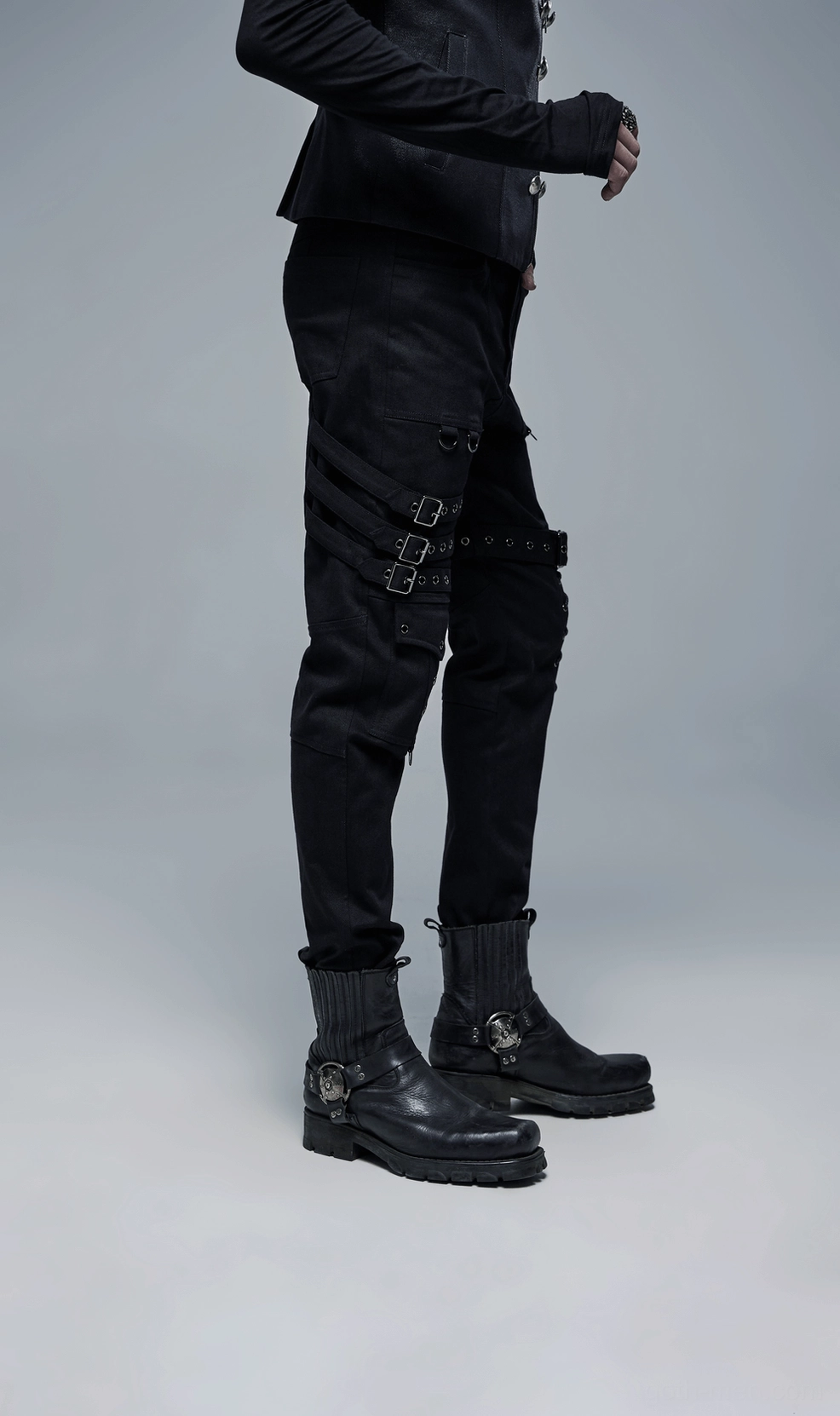 Gothic men's cargo pants leg detail showing lace-up system, metal eyelets, and fitted calf silhouette