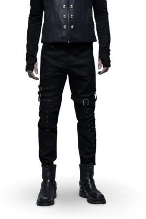 Men's black gothic cargo pants front view with buckle straps and lace-up leg details, worn by model on white background