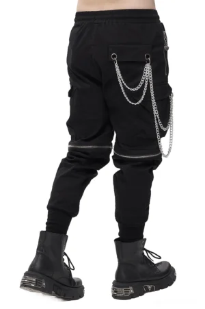 Back three-quarter view of black punk cargo pants showing metal chain accents and ribbed ankle cuffs