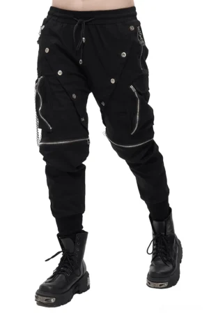 Male model wearing black gothic cargo pants with metal buttons and detachable chain, front three-quarter view