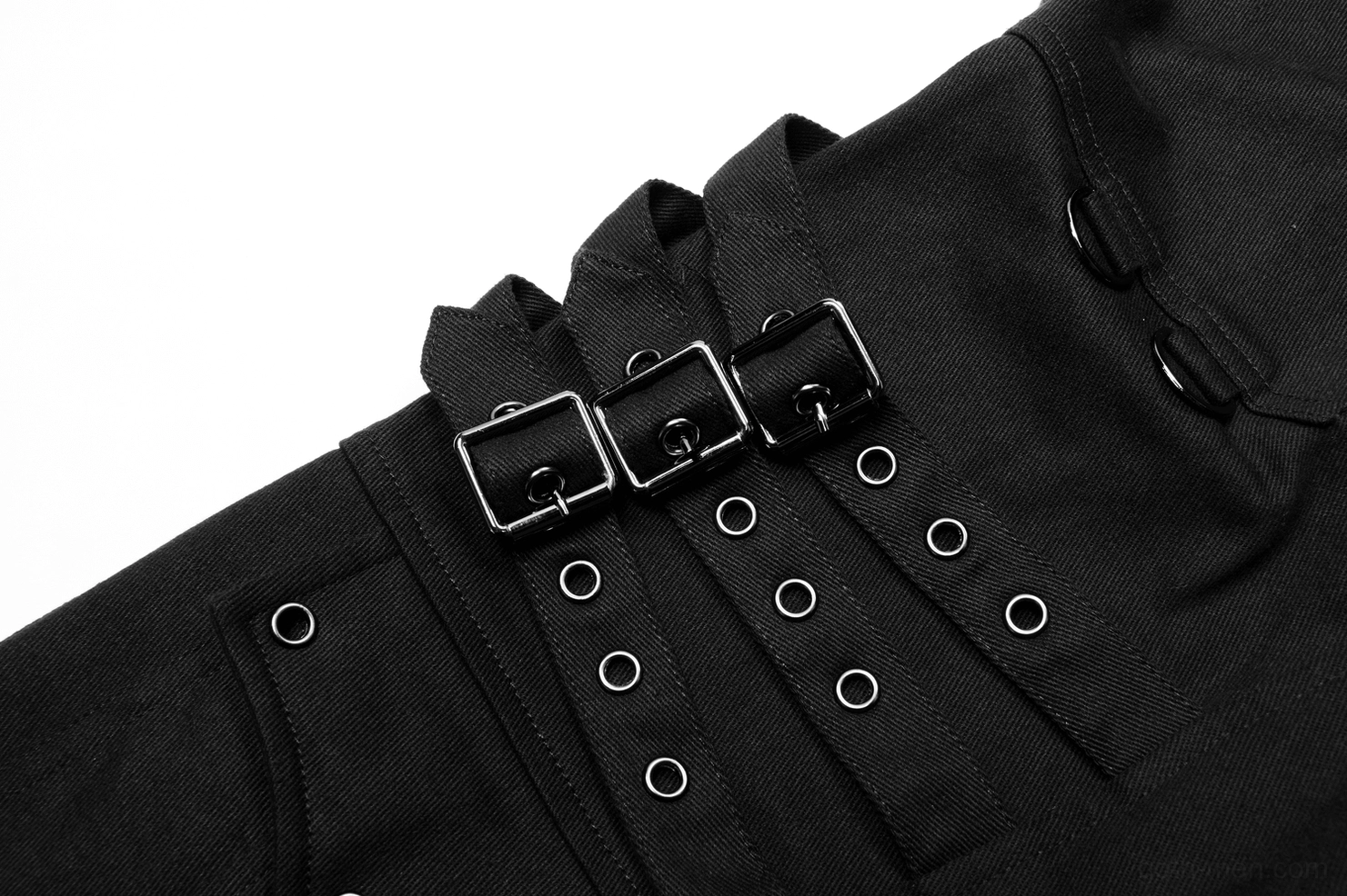 Multi-point buckle strap detail close-up showing metal buckles, eyelets, and functional cargo design on gothic pants