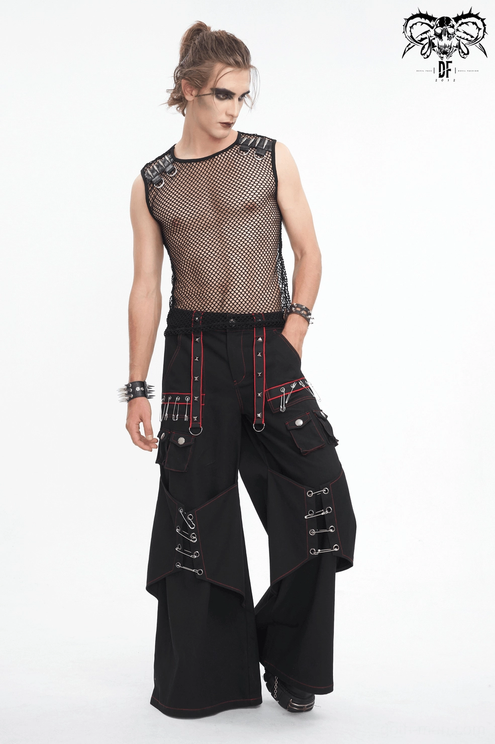 Gothic cargo pants asymmetrical panel detail showing layered design and metal accents