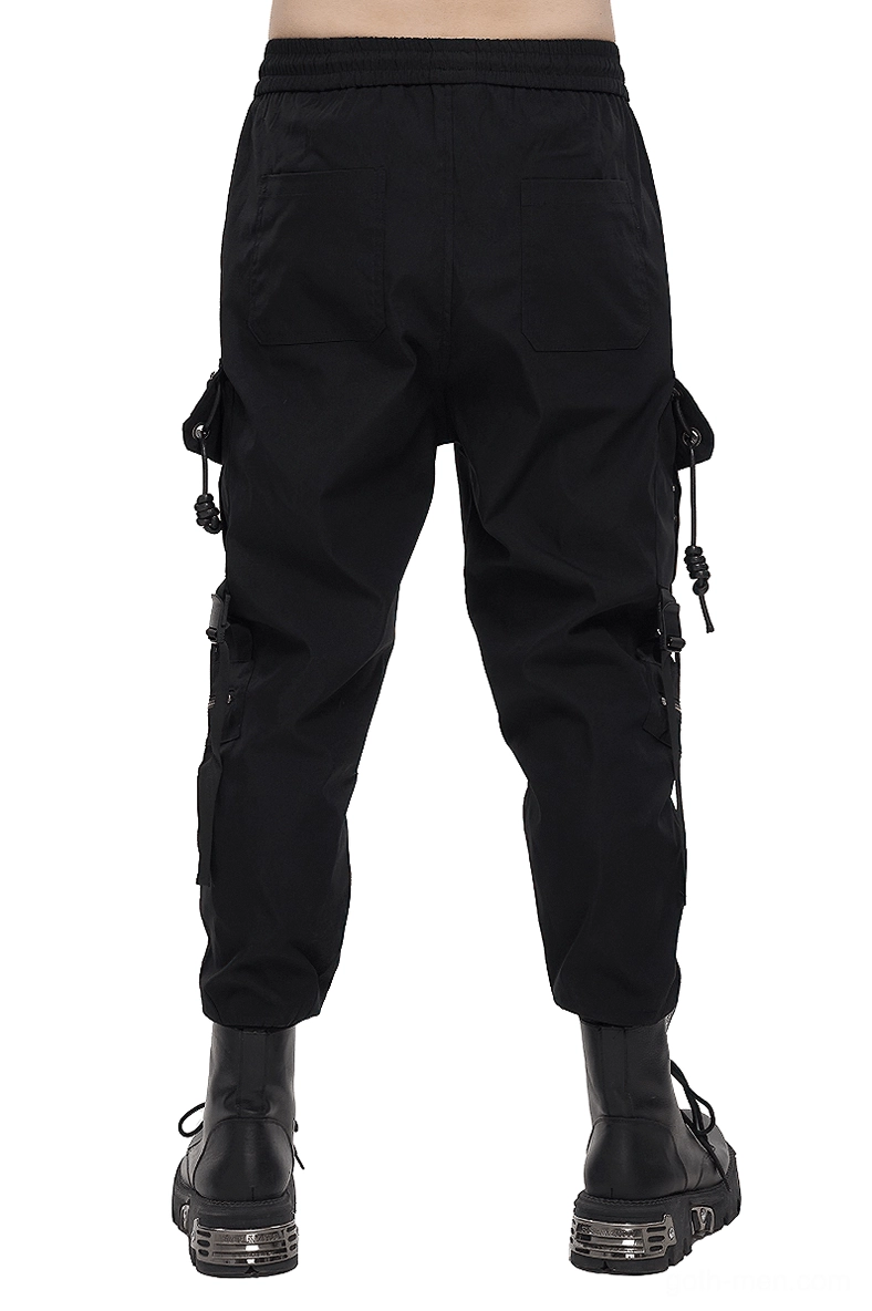 Back view of black gothic cargo pants with elastic waistband and ribbed ankle cuffs, rear patch pockets detail