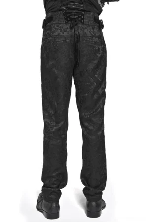 Black jacquard brocade gothic cargo pants rear view showing lace-up waistband and tapered leg silhouette