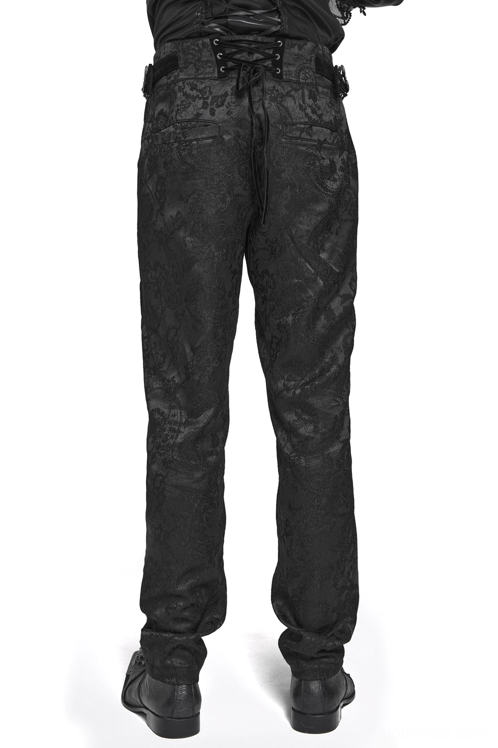 Black jacquard brocade gothic cargo pants rear view showing lace-up waistband and tapered leg silhouette