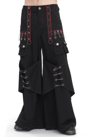 Gothic black wide-leg cargo pants with red topstitching and metal accents front view on male model
