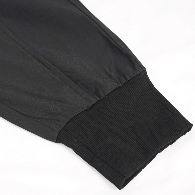 Ankle cuff detail of black gothic cargo pants showing ribbed knit texture and soft woven fabric construction