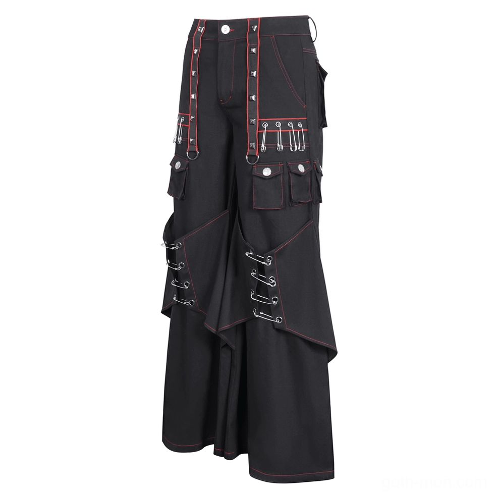 Black gothic cargo pants three-quarter view showing asymmetrical layered panels and red stitching
