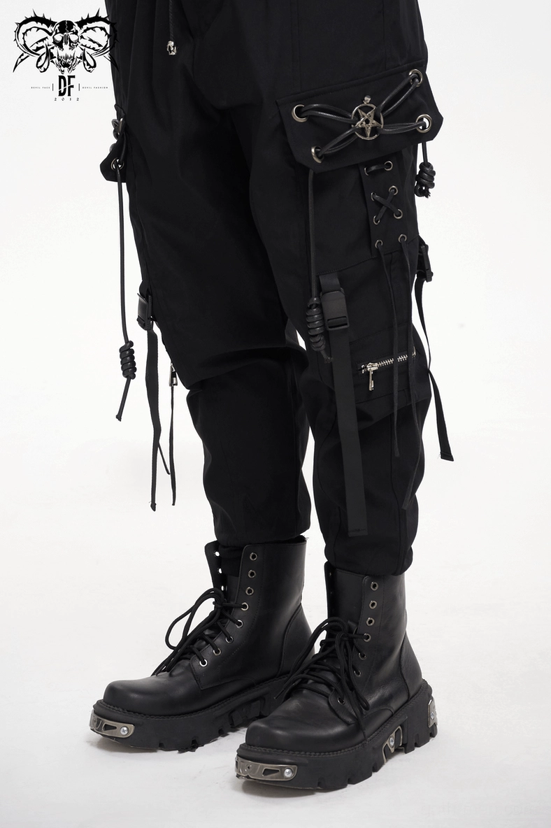 Black gothic cargo pants side profile showing tactical strap placement, leg opening, and loose silhouette design