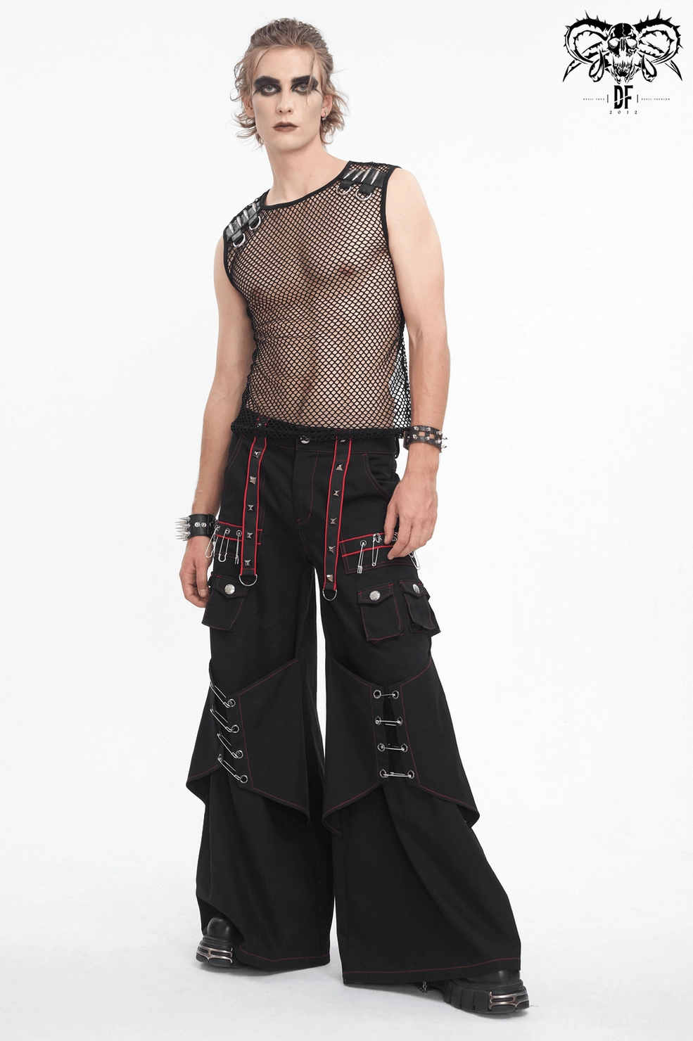 Industrial gothic cargo pants thigh pocket design with red stitching and layered construction