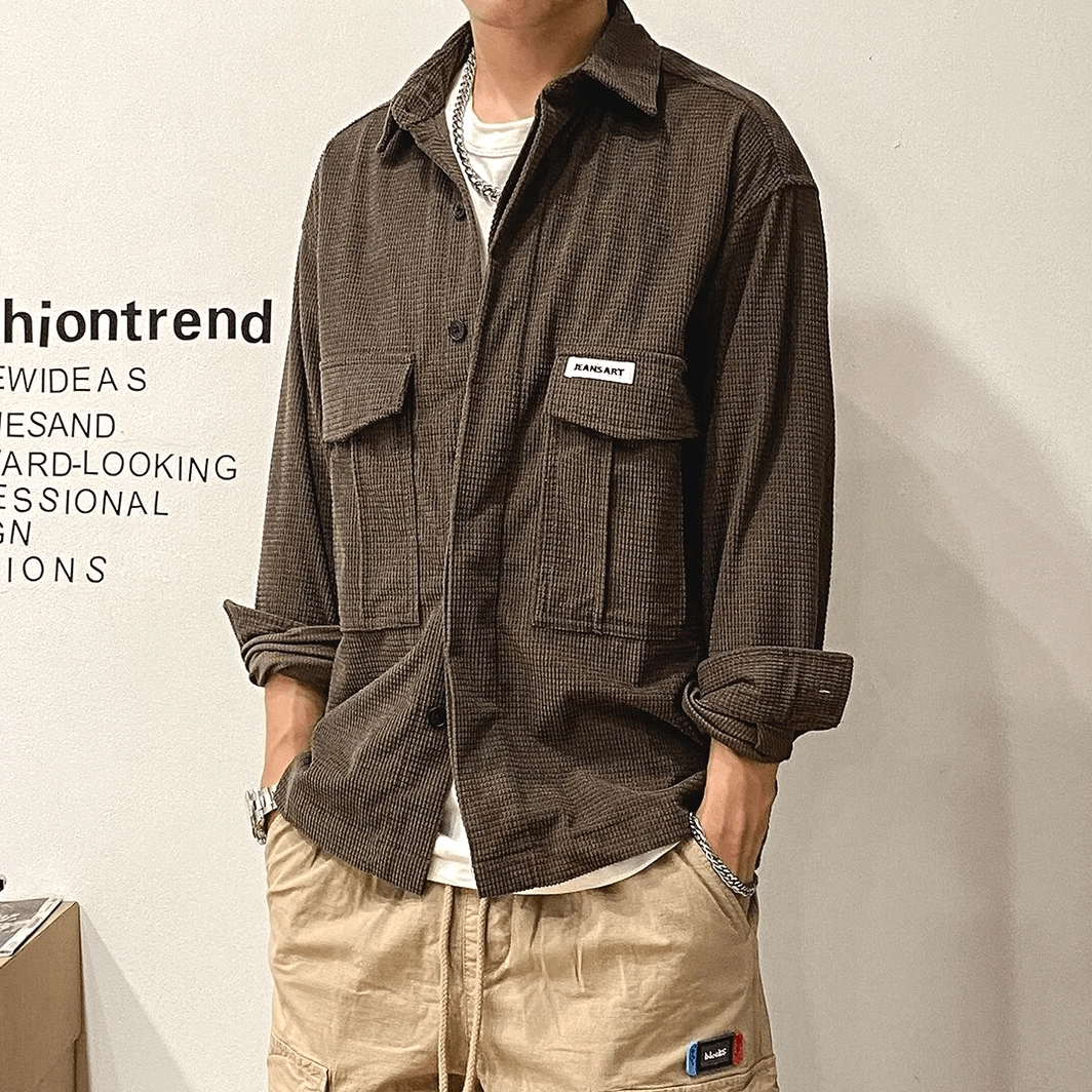 Back view of oversized gothic cargo shirt emphasizing overall silhouette, shoulder seams, and sleeve proportions for oversized alternative menswear fit