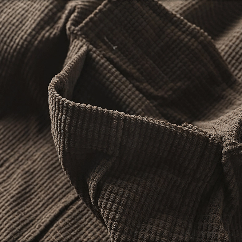 Oversized gothic cargo shirt detail of fabric care and maintenance, showing durability of broadcloth construction for long-term alternative wardrobe investment