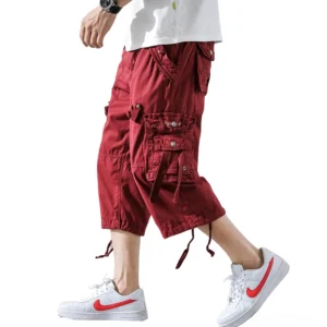 Men's burgundy gothic cargo shorts rear view with flap pockets and drawstring cuffs