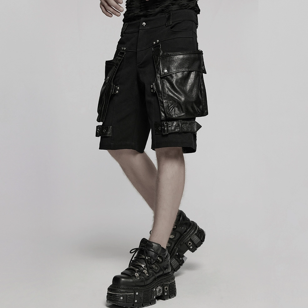 Product photography of black gothic cargo shorts highlighting oversized pocket design and metallic accents