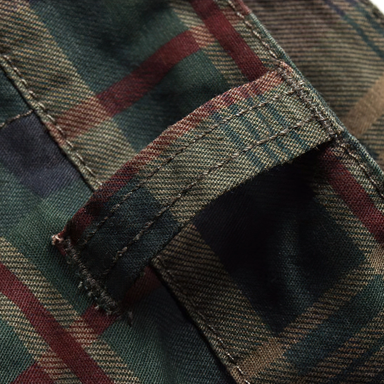 Full-body styling view of men's tartan plaid cargo shorts with alternative outfit pairing