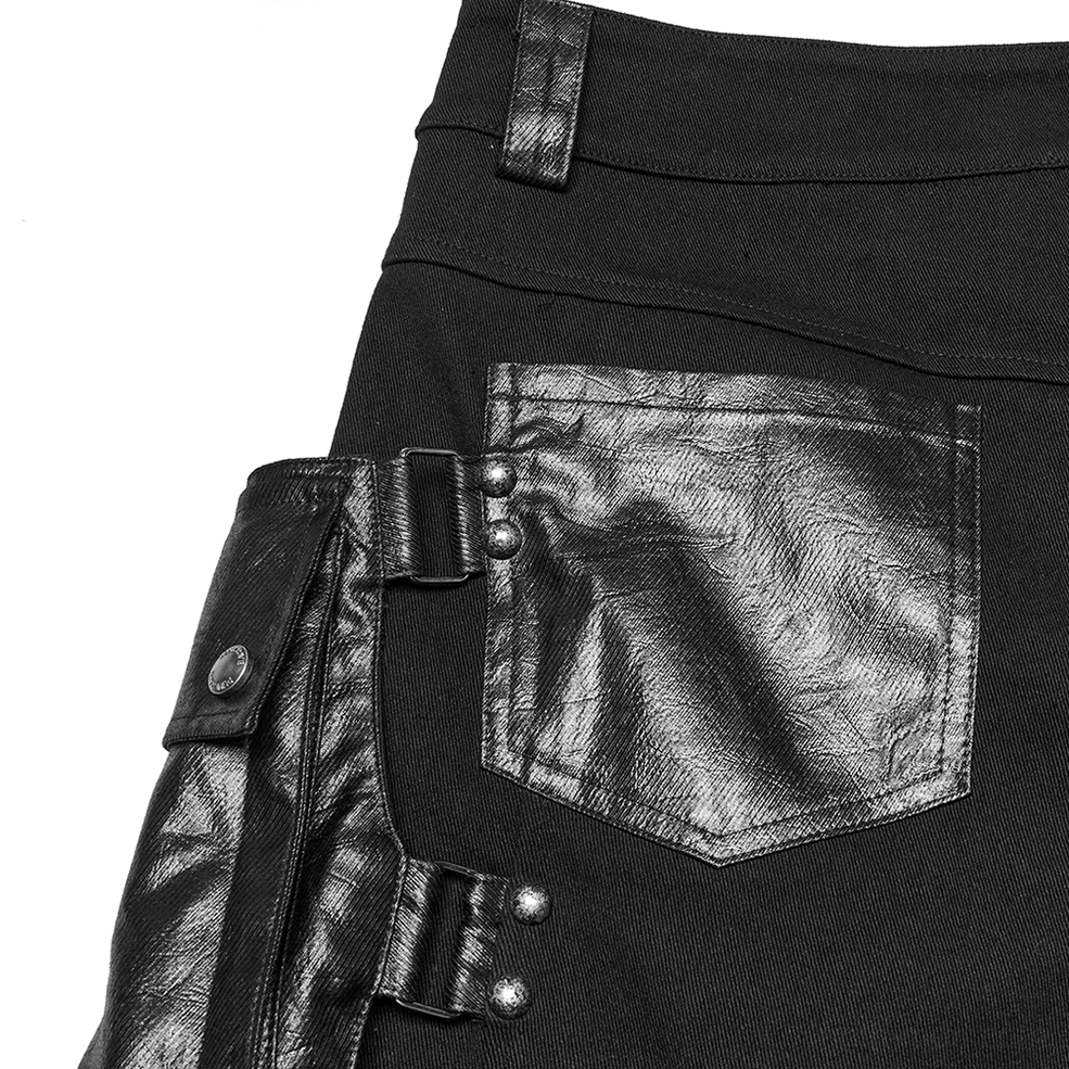 Extreme close-up of black leather rear pocket with waistband trim and quality construction details