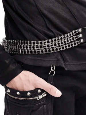 Gothic motorcycle chain belt worn on waist, black leather with metal chains detail on dark streetwear outfit