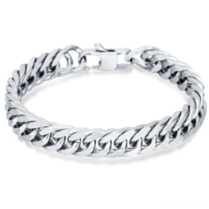 Overhead flat lay of silver stainless steel gothic chain bracelet with closed lobster clasp