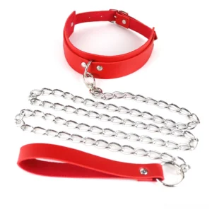 Red leather and silver metal chain gothic collar with leash - flat lay composition showing complete adjustable harness design