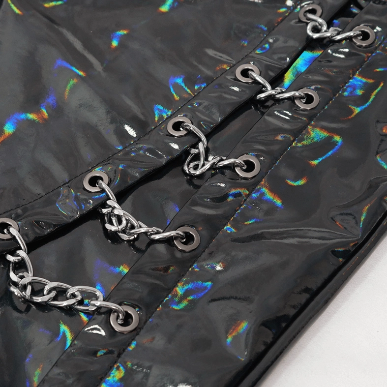 Punk pants chain trim detail - close-up of silver metal chains and circular eyelet fasteners