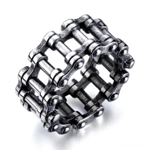 Stainless steel gothic chain link ring frontal view, polished silver finish on white background, biker style jewelry