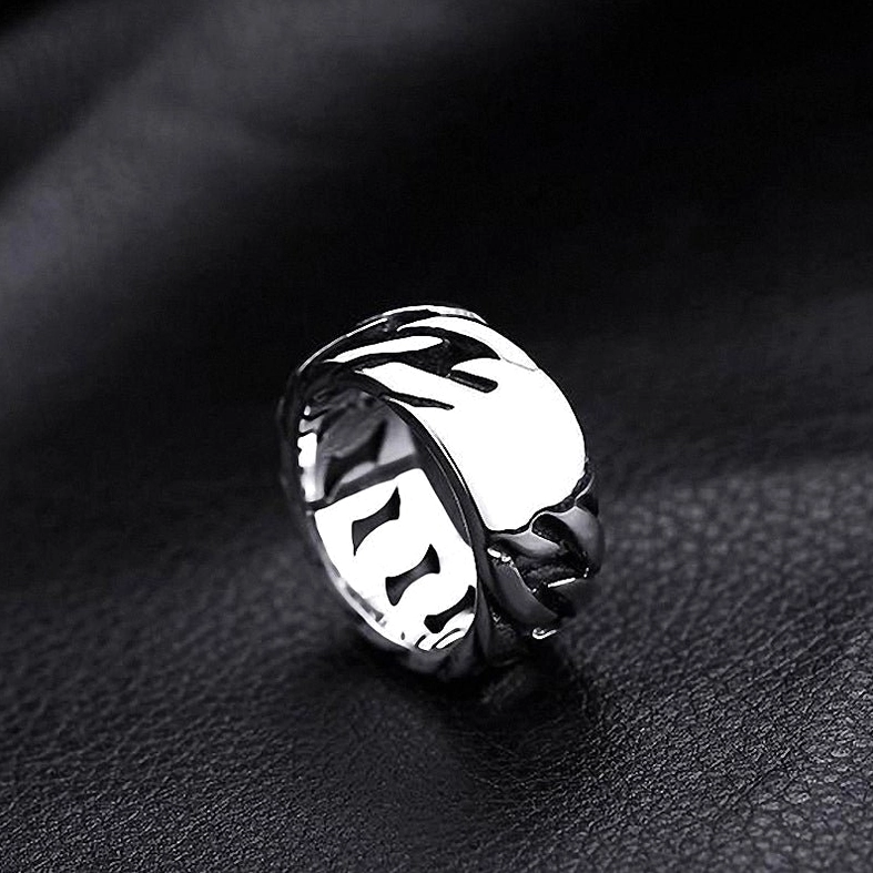 Dark silver gothic chain ring showing woven hollow design from oblique inner side angle