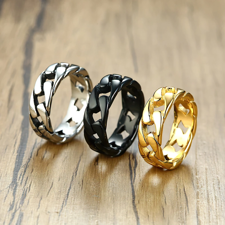 Complete gothic stainless steel chain ring set showcasing silver, black and gold finishes side by side