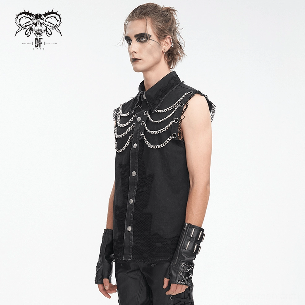 Textured close-up of black gothic sleeveless vest showing chain layering and distressed fabric details