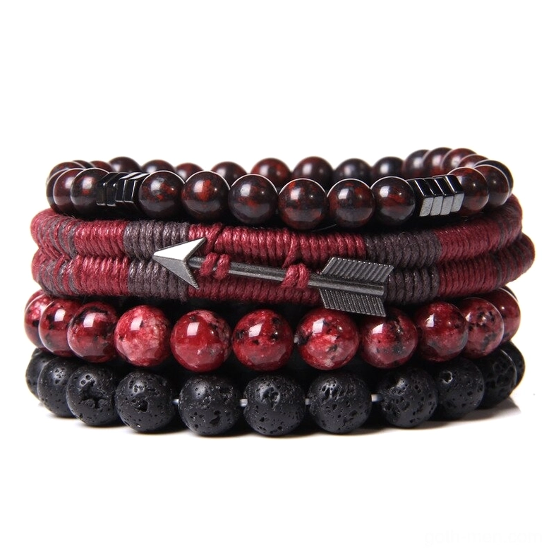 Crimson shadow multi-layer gothic bracelet featuring speckled red beads, black lava stones, wine-red wooden accents, and black arrow charm detail
