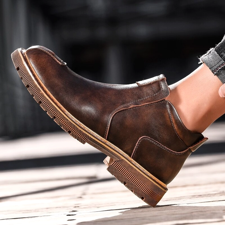 Gothic split leather Chelsea boots for men, detailed close-up of construction and texture