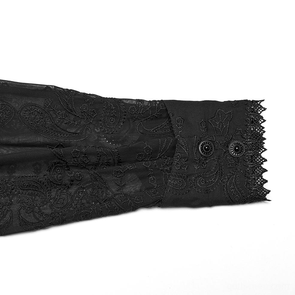 Close-up detail of scalloped lace cuff trim and embroidered paisley pattern on black gothic chiffon shirt