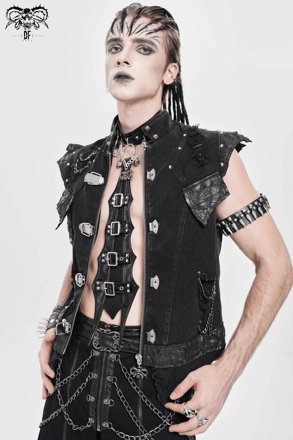 Black gothic choker with metal eyelets and chains displayed on model in studio fashion shoot