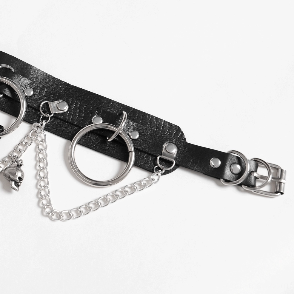 Side angle close-up of gothic choker showing black PU leather texture with silver metal hardware and skull chain