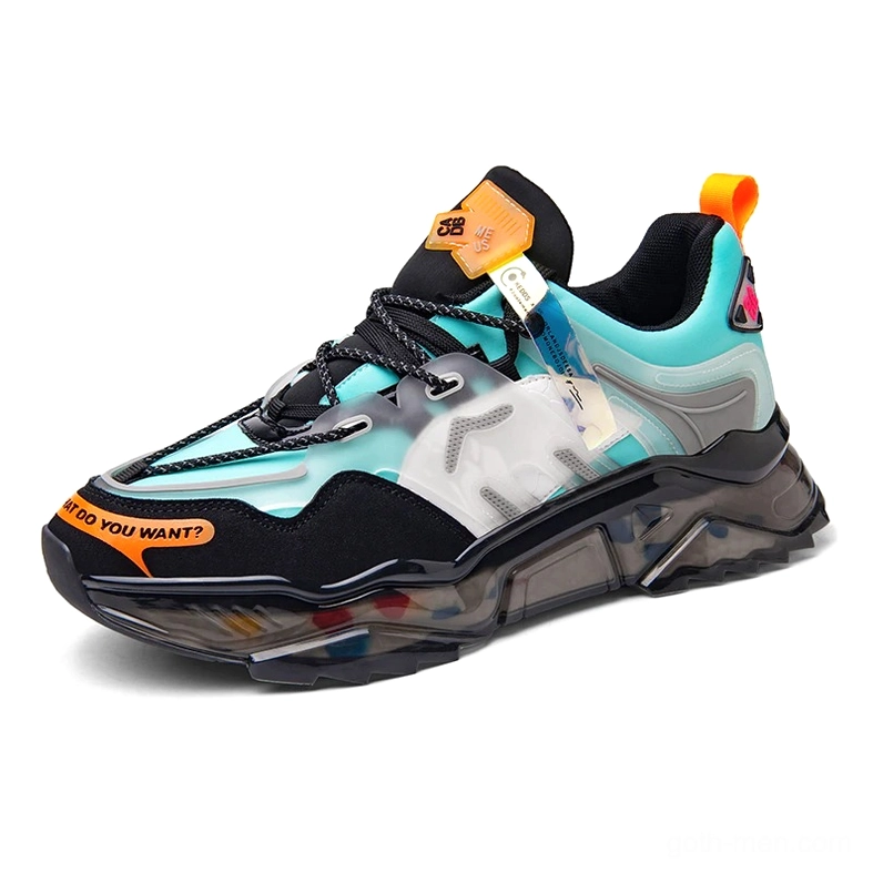 Gothic chunky sneaker left side view with color-blocked black and blue upper, transparent jelly sole, and industrial design aesthetic