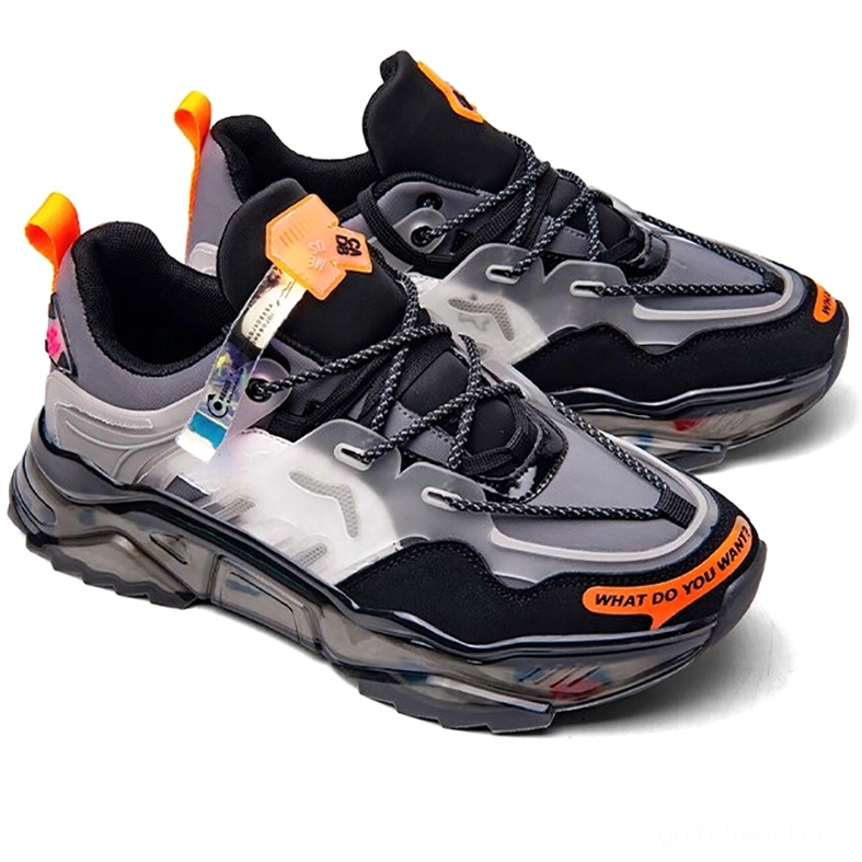 Pair of gothic chunky sneakers rear view displaying heel pull tabs and transparent colored outsole construction
