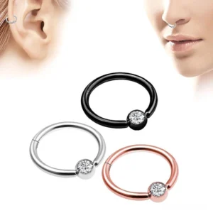 Multi-color gothic hinged clicker nose rings with cubic zirconia - silver, rose gold, and black plating options shown on model ear