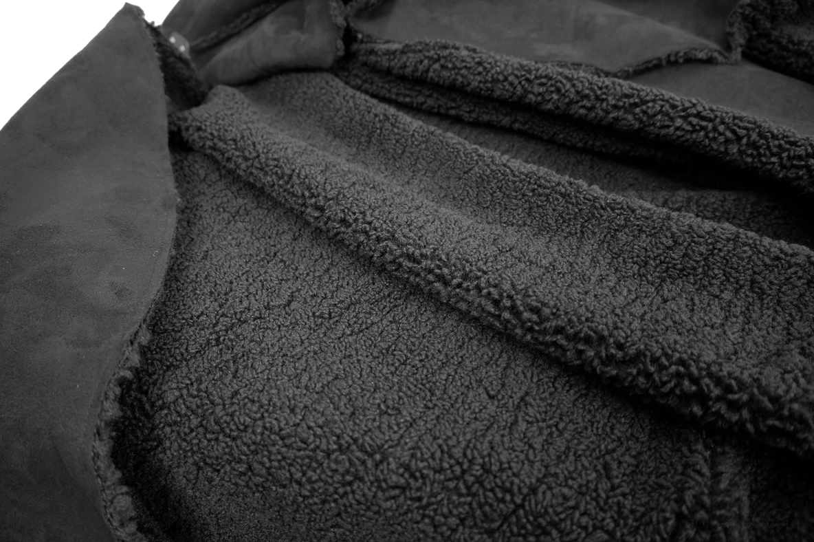Gothic cloak hood detail showing oversized collar framing and fleece interior lining
