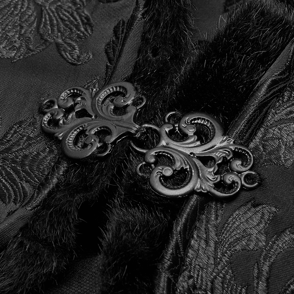Close-up detail of Gothic cloak's decorative metal scroll clasp fastener with fuzzy velvet trim and jacquard fabric