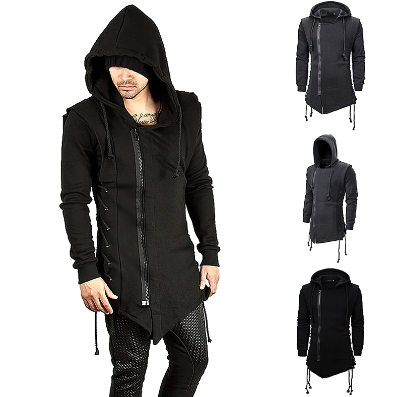 Black gothic assassin coat with side lace details worn by male model in three-quarter angle showing silhouette