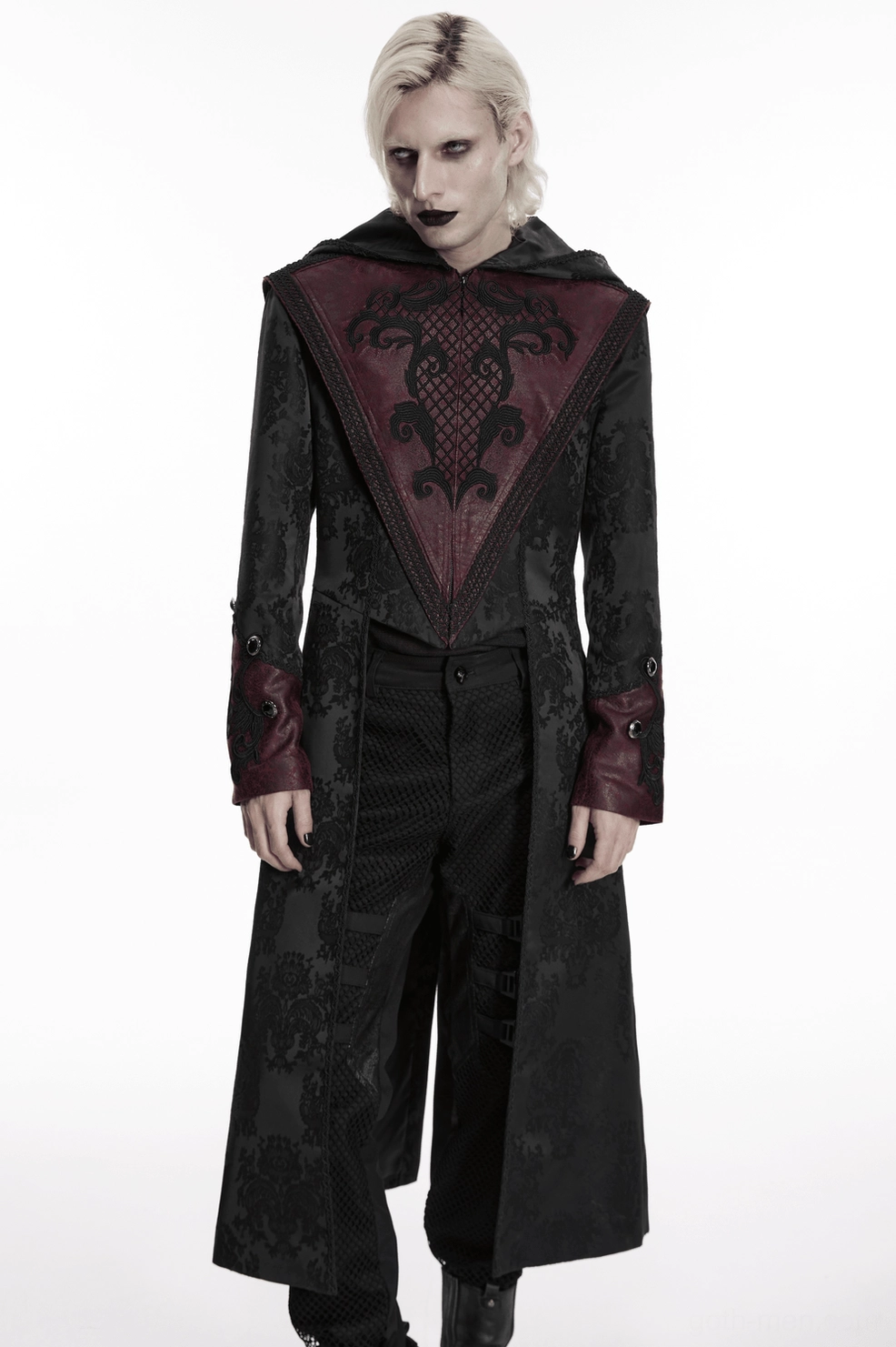 Gothic hooded coat construction detail, jacquard fabric weave, leather panels, metal hardware, embroidered trim craftsmanship