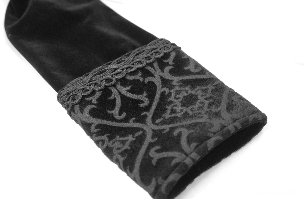 Close-up of black gothic velvet coat cuff with embroidered pattern and decorative lace trim detail