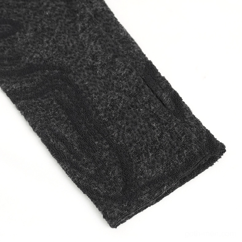 Close-up detail of marbled knit fabric showing brushed texture and stitched seam construction