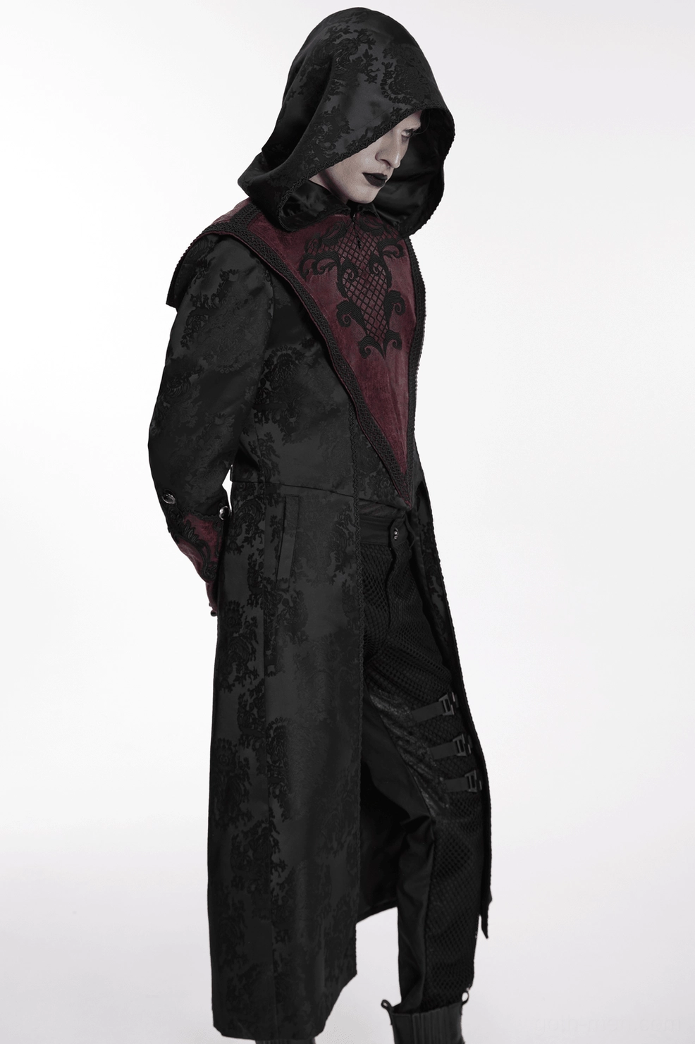 Gothic jacquard coat hooded design, dark alternative fashion, full-body silhouette, embroidered and leather trim details visible