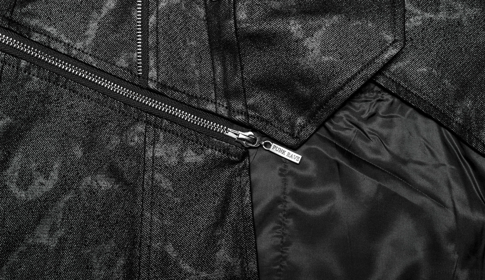 Gothic coat interior lining and structural seam detail showing quality construction