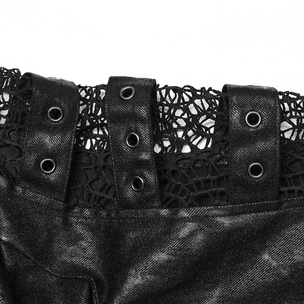 Close-up detail of mesh fabric panel and metal eyelet straps on gothic coat