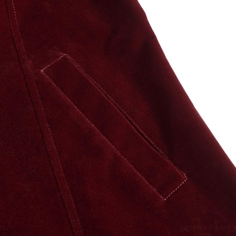 Wine red velvet gothic coat side pocket detail showing functional pocket opening on tailored garment