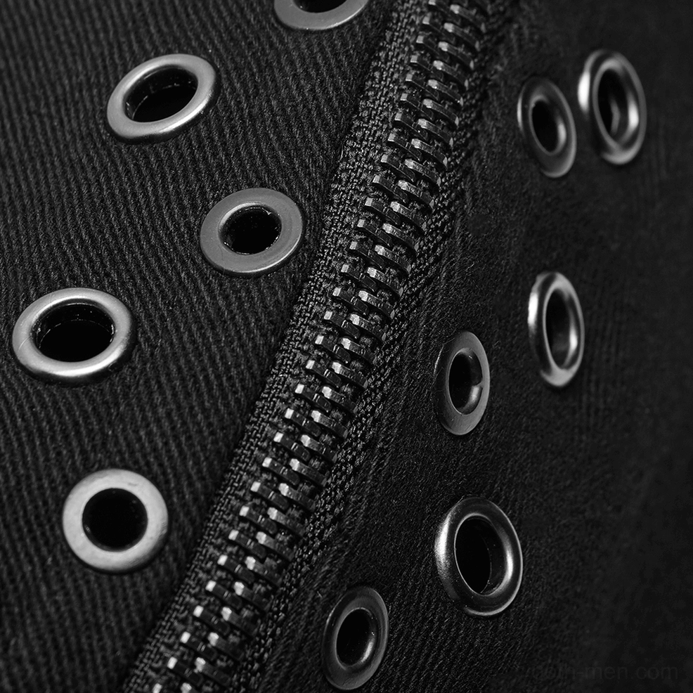 Close-up view of black gothic coat zipper hardware and leather accent construction details
