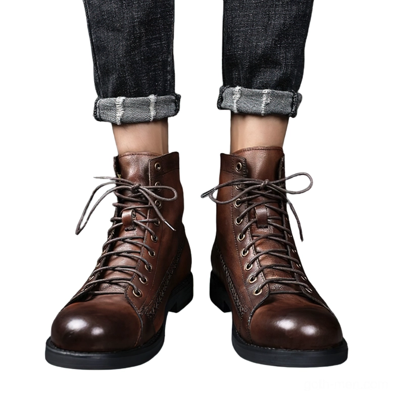 Men wearing black and brown gothic lace-up combat boots styled with rolled denim