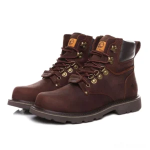 Gothic lace-up combat boots in dark brown genuine leather with metal lace hardware - front three-quarter view showcasing round toe and military-inspired design